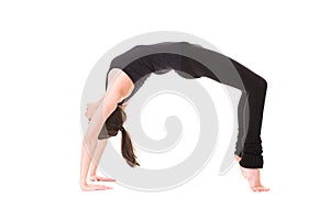 Young attractive female in stretch pose, isolated