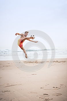 Young attractive girl jumping with Brazil flag in the air