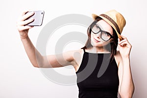 Young attractive girl taking selfie photo