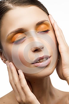 Young attractive girl on a white background