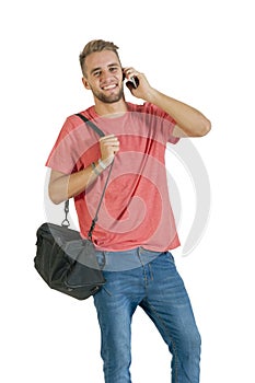 Young attractive guy chatting on his mobile phone