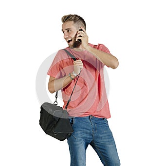 Young attractive guy chatting on his mobile phone