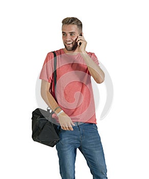 Young attractive guy chatting on his mobile phone