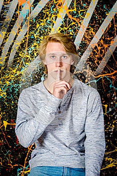 Young attractive guy posing in studio