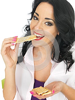 Young Attractive Healthy Woman Eating Mixed Dried Fruit Bars