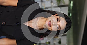 Young attractive Lebanese businesslady close up vertical portrait