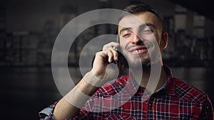 Young Attractive Lumbersexual Man Talking by Phone