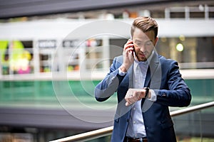 Young attractive man being late to an appointment