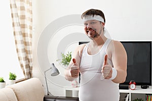 Young attractive man engaged in fitness