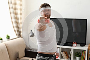 Young attractive man engaged in fitness