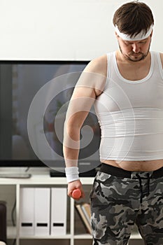 Young attractive man engaged in fitness