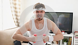 Young attractive man engaged in fitness