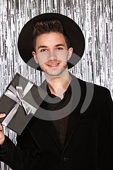 Young attractive man in a festive New Year's look