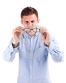 Young attractive man hold glasses isolated