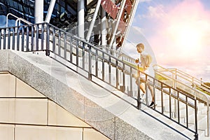 Young attractive man running in stairs