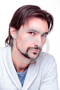 Young attractive man is suggestively looking into the camera