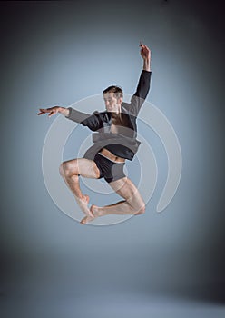 The young attractive modern ballet dancer jumping