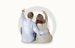 Young attractive smiling couple thinking of future or past together on white and copy space