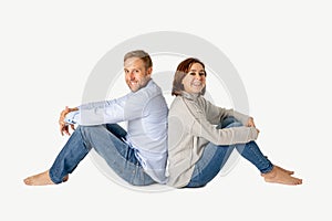 Young attractive smiling couple thinking of future or past together on white and copy space