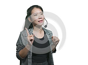 Young attractive and successful Asian Japanese woman in microphone headset coaching and training business strategies talking in