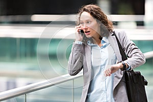 Young attractive woman being late to a rendez-vous