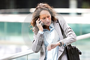 Young attractive woman being late to a rendez-vous