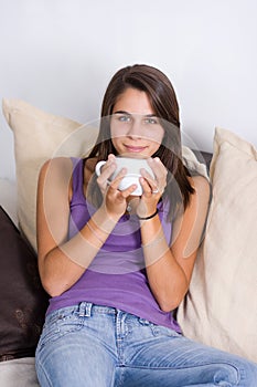 Young attractive woman with a cup of coffee