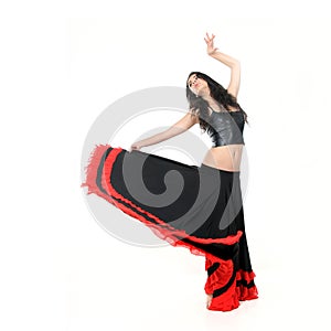 Young attractive woman dancing flamenco