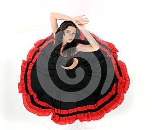 Young attractive woman dancing flamenco