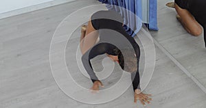 Young attractive woman dancing in studio