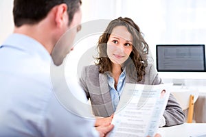 Young attractive woman during job interview