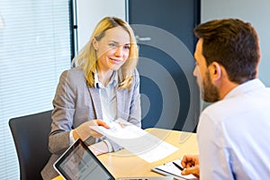 Young attractive woman during job interview