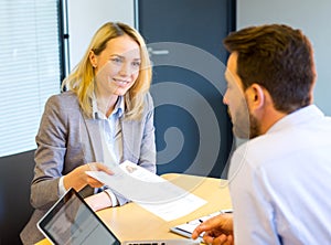 Young attractive woman during job interview