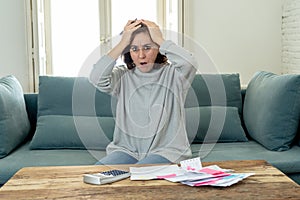 Upset young woman stressed about credit card debts and payments not happy accounting finances