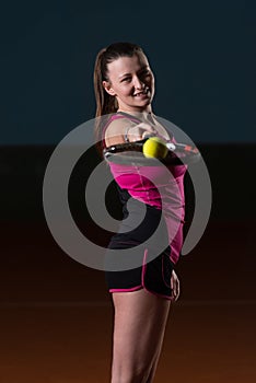 Young Attractive Woman Playing Tennis photo