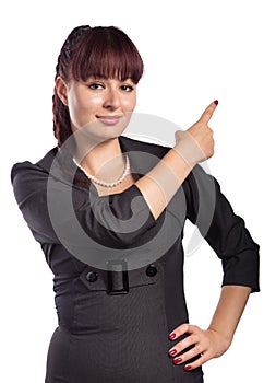 Young attractive woman points the finger at something