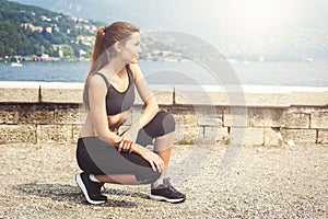 Young attractive woman outdoors near the lake