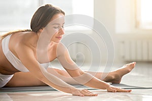 Young attractive woman in Straight Angle pose, white color backg