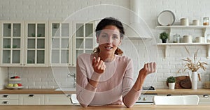 Young attractive woman takes part in video call communication