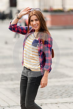 Young attractive woman visit city