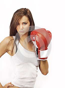 Young attractive woman wearing red boxing gloves