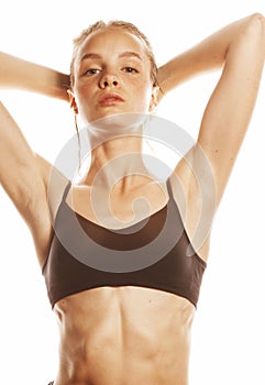 Young attractive woman wet long hair after workout