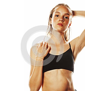 Young attractive woman wet long hair after workout isolated