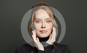 Young attractive woman with white arrows over face. Anti aging treatment and plastic surgery concept