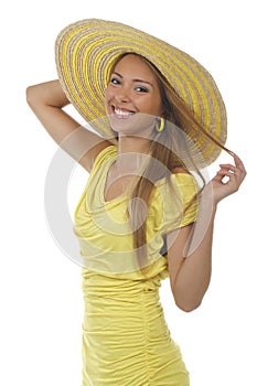 Young attractive woman with yellow shirt and strawhat