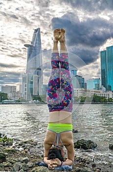 Young attractive woman in yoga posture,