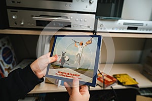 Young Audiophile Exploring Open 'Get Yer Ya-Ya's Out' SACD by the