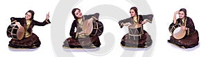 The young azeri woman playing traditional drum nagara