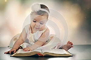 Young baby girl and Bible