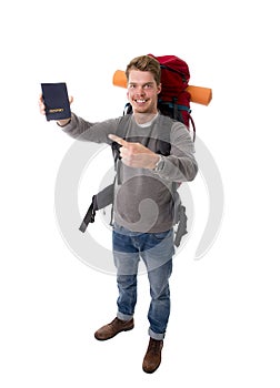 Young backpacker tourist holding passport carrying backpack ready for travel